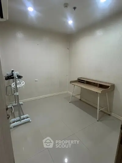Minimalist study room with sleek desk and modern lighting