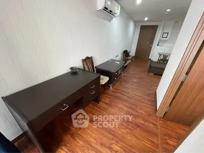 Modern apartment interior with wooden flooring and stylish furniture