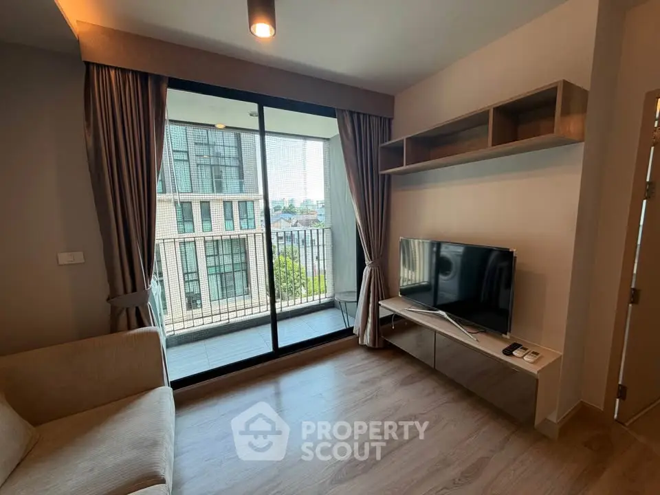 Modern living room with balcony view in urban apartment