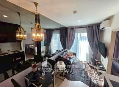 Modern living room with elegant decor and natural light, featuring a cozy dining area and stylish lighting fixtures.