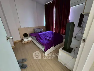 Cozy bedroom with modern decor and natural light