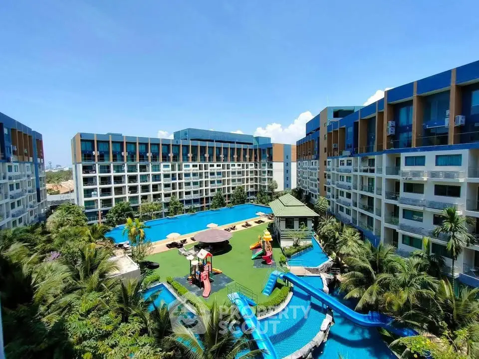 Luxurious resort-style apartment complex with stunning pool and lush gardens.