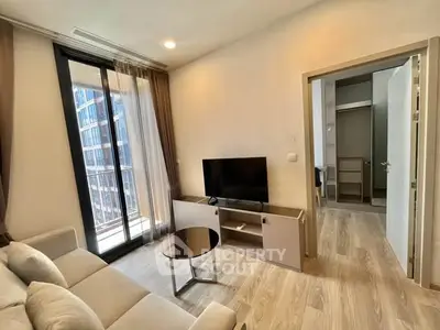 Modern living room with balcony view in a stylish apartment