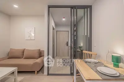 Modern living room with cozy sofa and dining area in stylish apartment