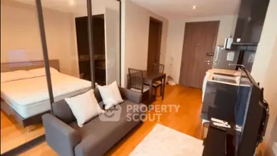 Modern studio apartment with open layout and stylish furnishings