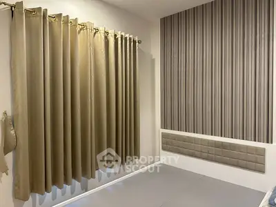 Modern minimalist bedroom with stylish curtains and textured accent wall