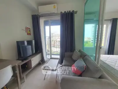 Modern living room with balcony view in stylish apartment