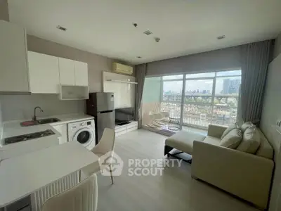 Modern living room with open kitchen and city view balcony in high-rise apartment