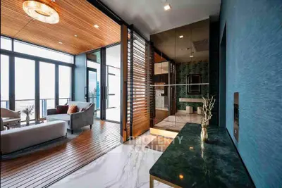Luxurious modern living room with open balcony and elegant interior design