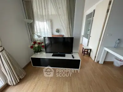 Modern living room with sleek TV stand and elegant decor