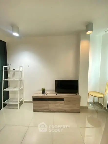 Modern minimalist living room with sleek furniture and neutral tones