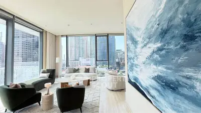 Luxurious modern living room with stunning city view and elegant decor