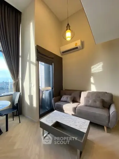 Modern living room with high ceiling and stylish furniture