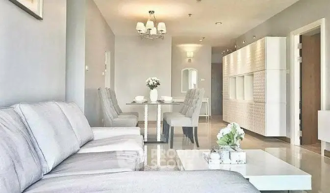 Spacious modern living room with elegant dining area and stylish decor