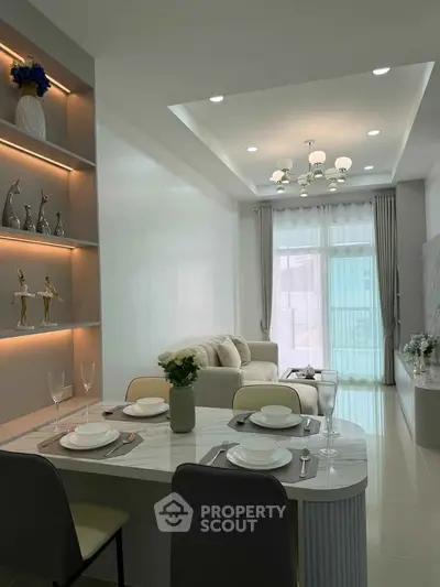 Modern living room with elegant dining area and stylish decor