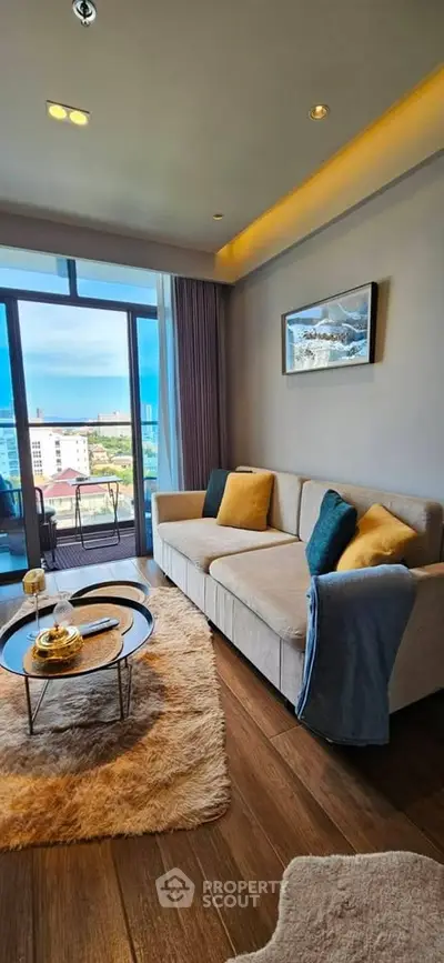 Luxurious living room with cozy sofa and stunning balcony view