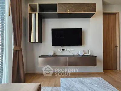 Modern living room with sleek TV unit and stylish decor