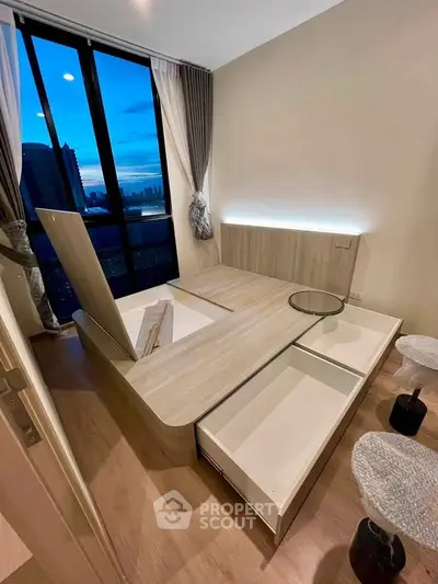 Modern bedroom with innovative storage solutions and city view, featuring sleek design and ambient lighting.