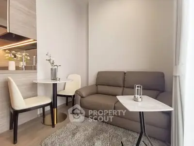 Cozy modern living room with elegant furniture and natural light