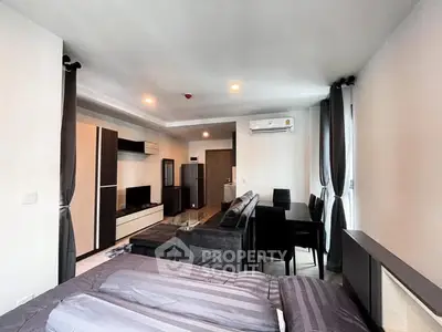 Modern studio apartment with open layout and stylish furnishings