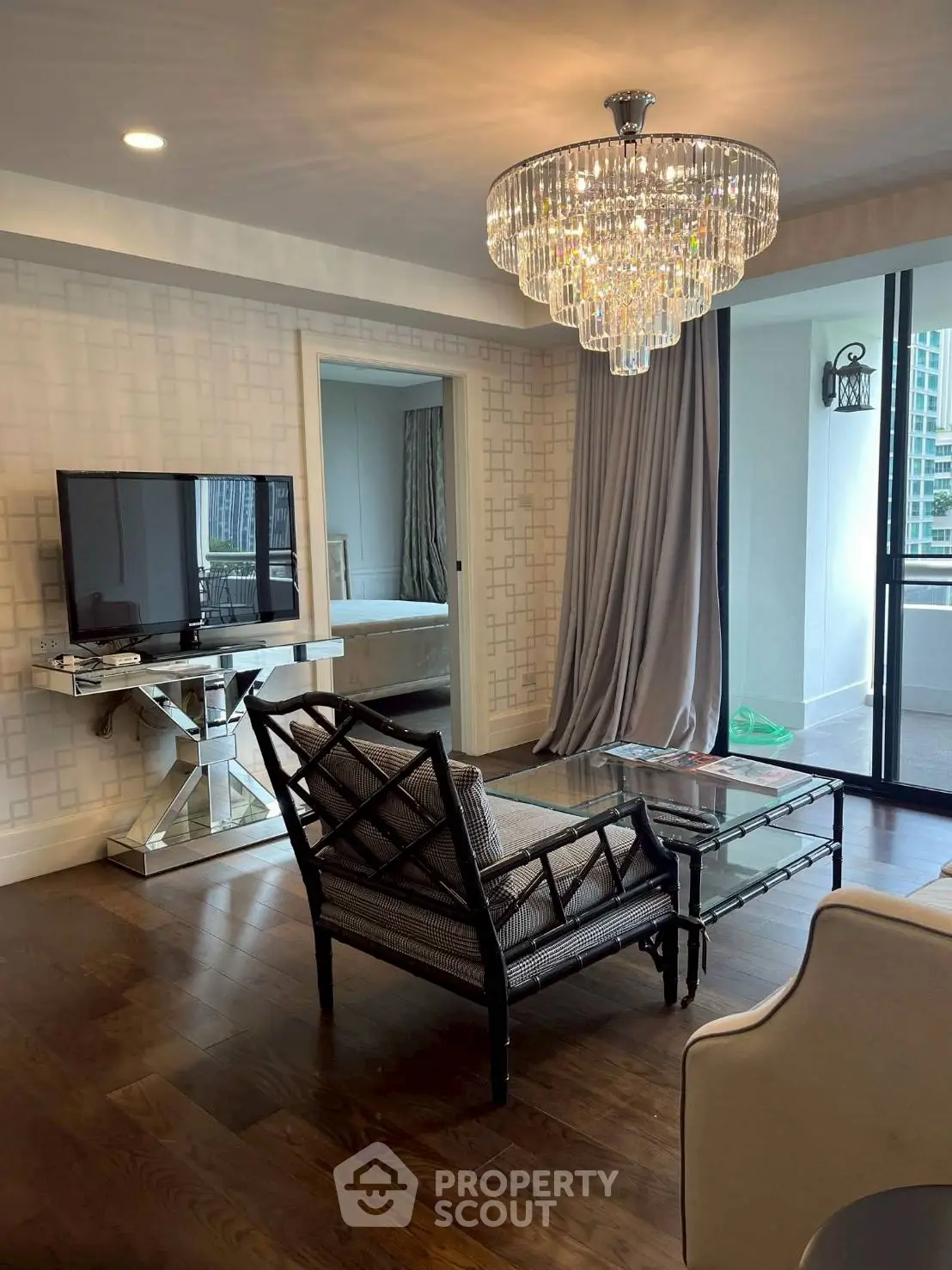 Luxurious living room with elegant chandelier and modern decor