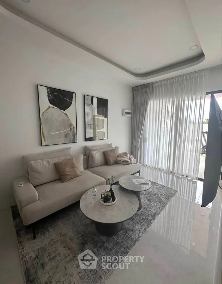 Modern living room with elegant decor and natural light