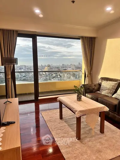 Spacious living room with stunning city view and elegant decor