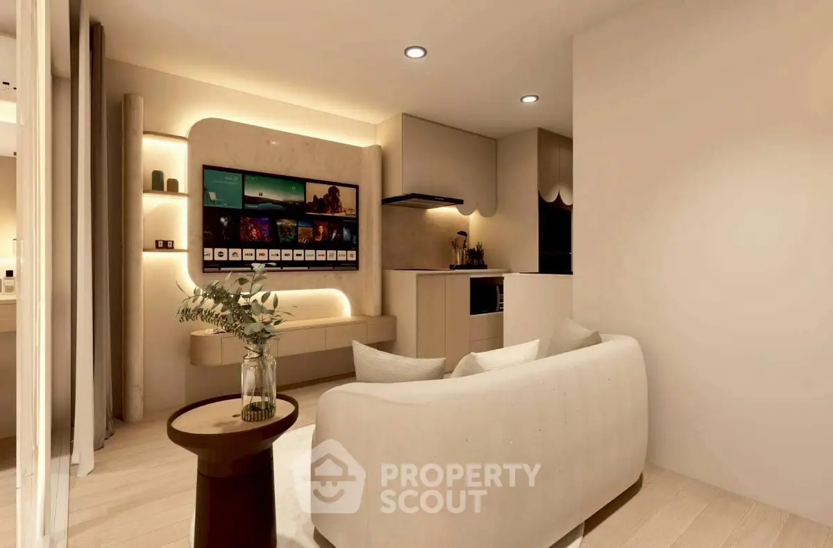 Modern living room with sleek design and open kitchen layout, featuring cozy seating and ambient lighting.