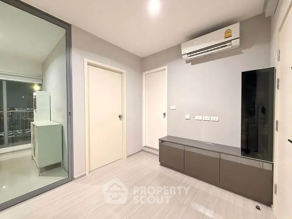 Modern apartment interior with air conditioning and sleek storage unit