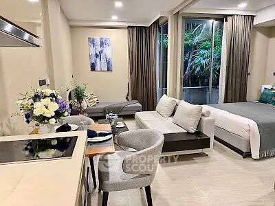 Modern open-plan living room with elegant decor and garden view