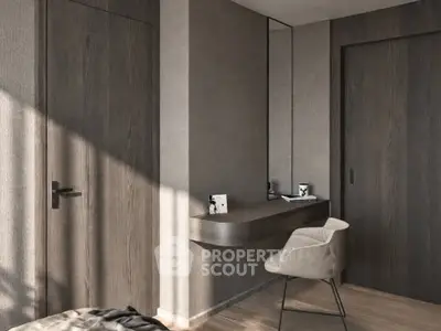 Modern minimalist study nook with sleek wooden finishes and stylish chair in a contemporary apartment.