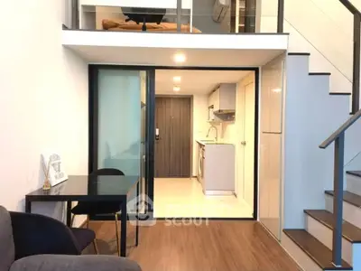 Modern duplex apartment with stylish interior and compact kitchen