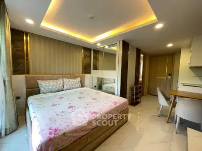 Luxurious bedroom with modern decor and elegant lighting in a stylish apartment.