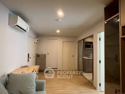 Modern apartment interior with open layout and wooden flooring