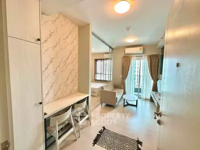 Modern apartment interior with open layout and balcony view