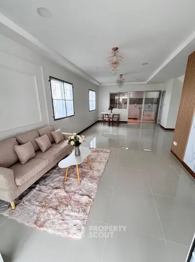 Spacious modern living room with elegant decor and natural light