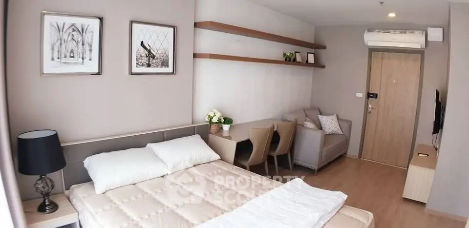 Modern studio apartment with cozy bedroom and stylish decor