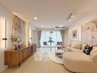 Spacious modern living room with elegant decor and natural light