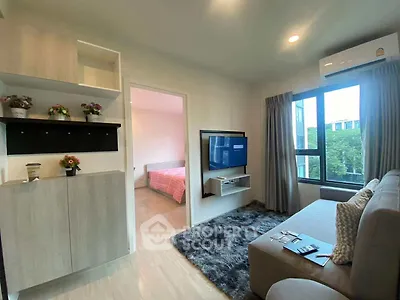 Modern living room with cozy decor and natural light
