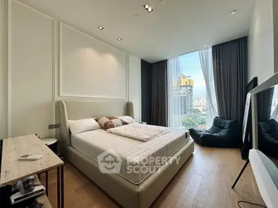Luxurious bedroom with stunning city view and modern decor