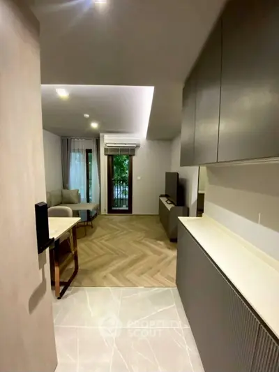 Modern apartment interior with open layout and balcony view