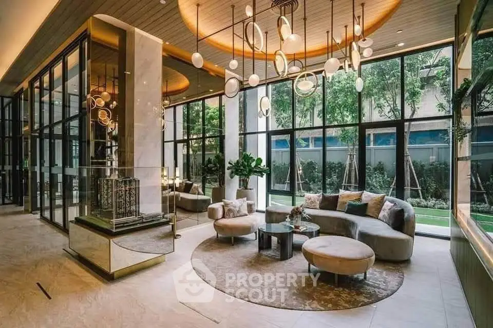 Luxurious modern living room with elegant lighting and large windows overlooking a garden.