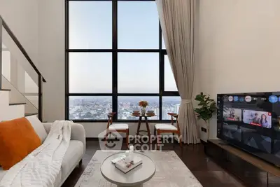Luxurious living room with stunning city view and modern decor