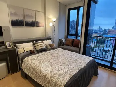 Cozy bedroom with city view and modern decor in urban apartment