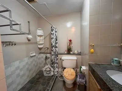 Cozy bathroom with modern fixtures and stylish tile design