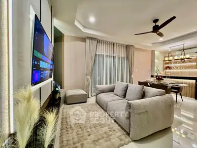 Luxurious modern living room with plush sofa and elegant dining area, perfect for entertaining.