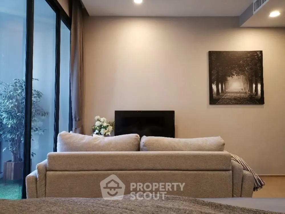 Modern living room with cozy sofa and elegant decor