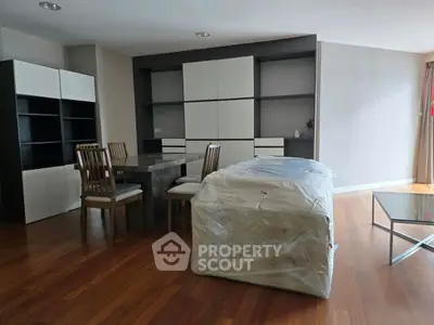 Spacious modern living room with dining area and stylish furniture