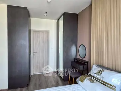 Modern bedroom with stylish furniture and elegant decor