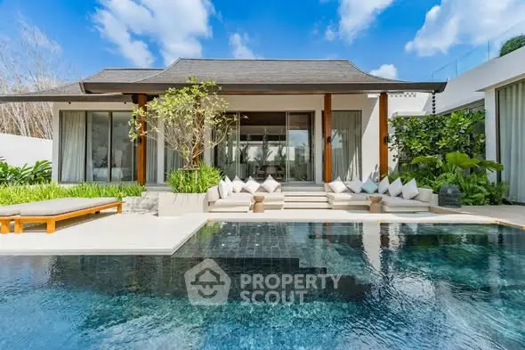 Luxurious villa with stunning pool and modern design, perfect for relaxation and entertainment.